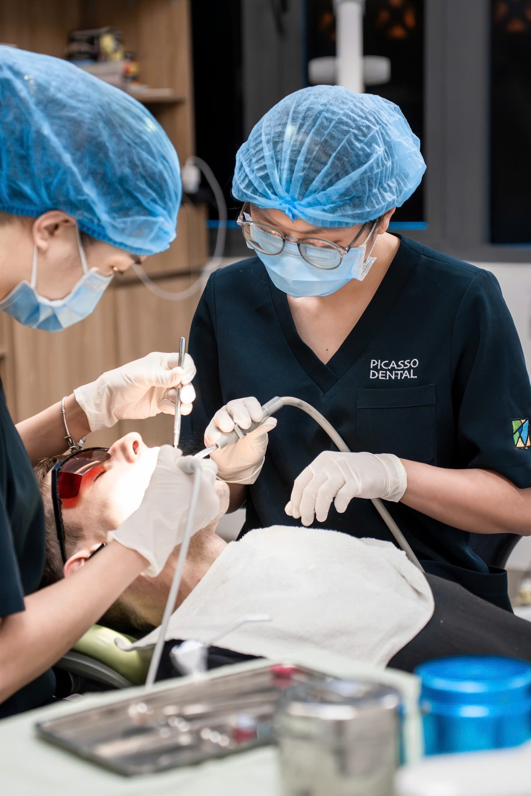 Dentist during treatment at Picasso Dental